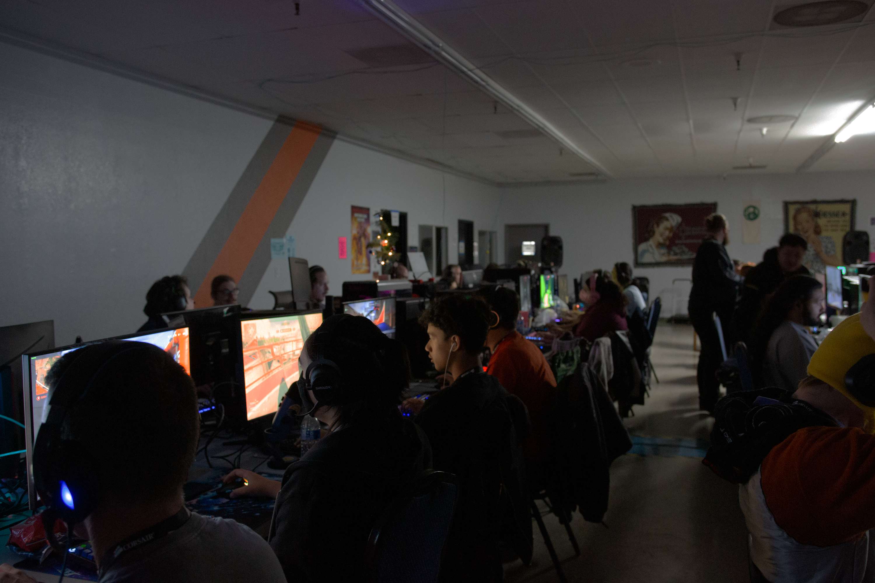 A group of people playing on their computers